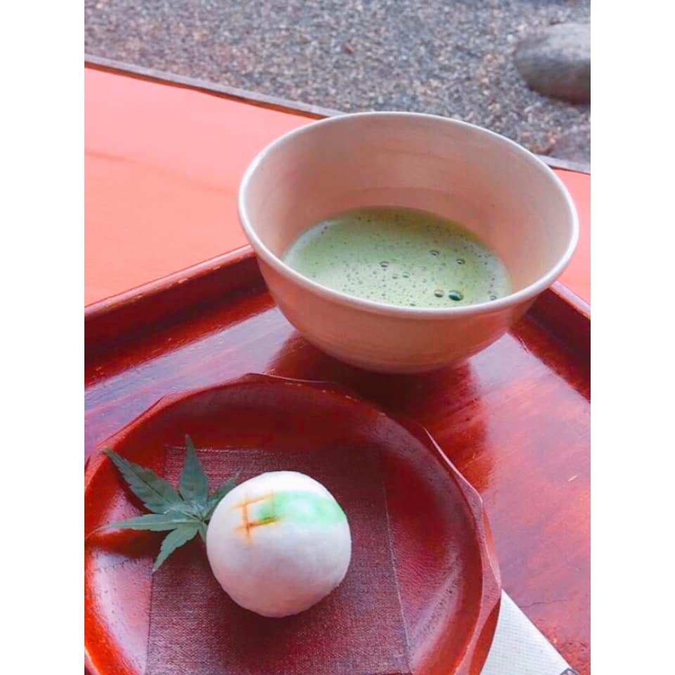 A sip of green tea with traditional Japanese sweets (和菓子)