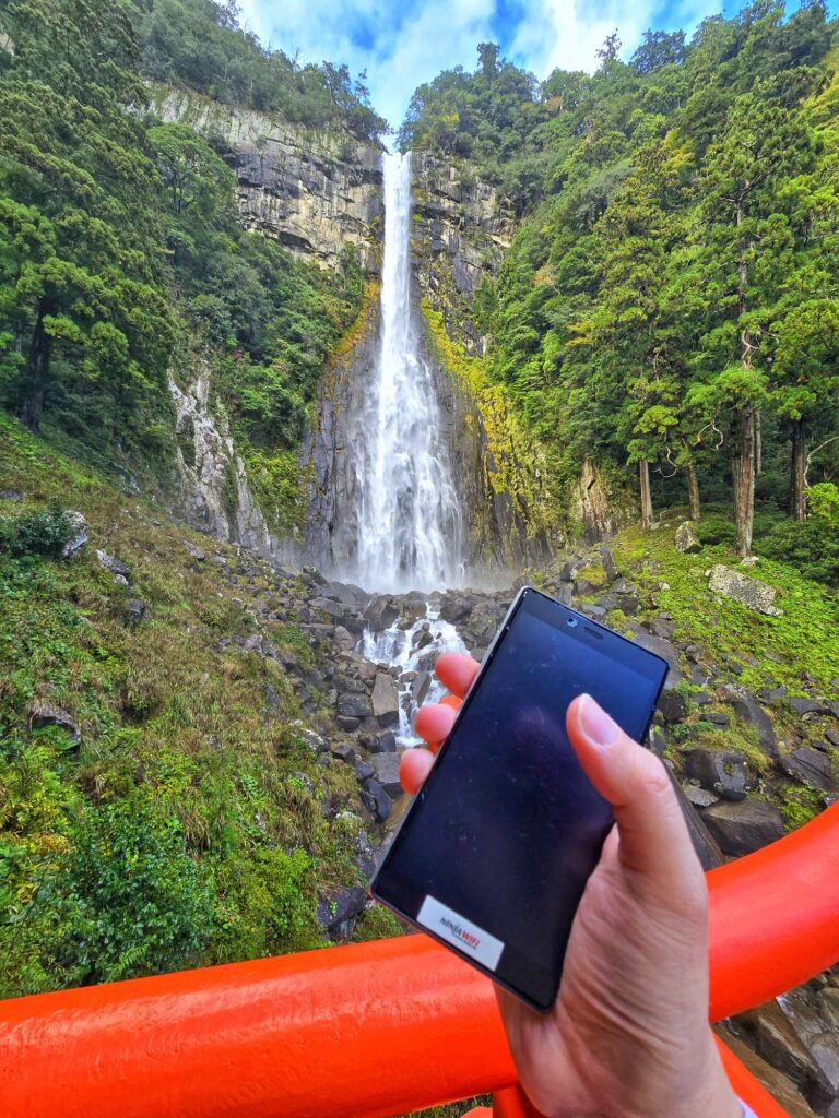 Admiring the majestic Nachi Falls up in the mountains